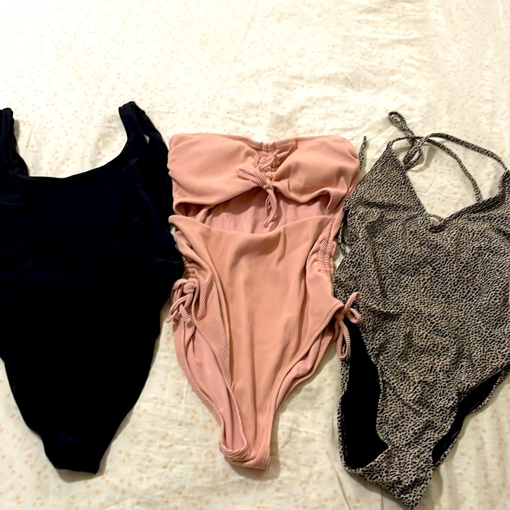 3 bathing suits size medium.